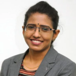 Aruna M